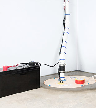 A sump pump installed in Milddetown by DryZone, LLC
