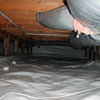 A sealed crawl space with an insulated hot air duct in Central Kent.