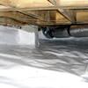 Bare floor joists in a sealed, insulated crawl space in Riverview.
