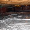 A sealed crawl space with support posts showing in Ocean Pines.
