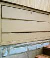 an old-fashioned crawl space door in Kent Acres about to be replaced