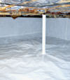 A sealed crawl space in Lewes with a vapor barrier