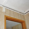 The ceiling and wall separating as the wall sinks with the slab floor in a Smyrna home