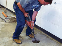 Coring the concrete of a concrete slab floor in Claymont