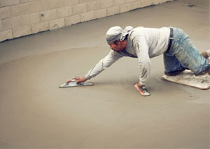 smoothing out the grout in a slab releveling project in Wilmington