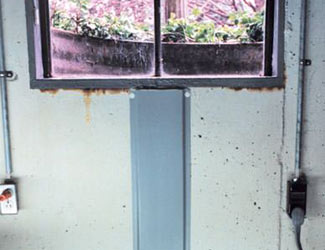 Repaired waterproofed basement window leak in Newark